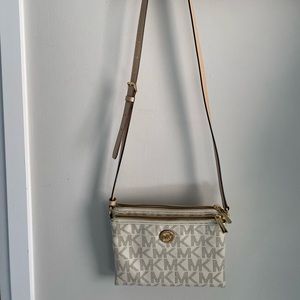 Michael Kors crossbody canvas bag.